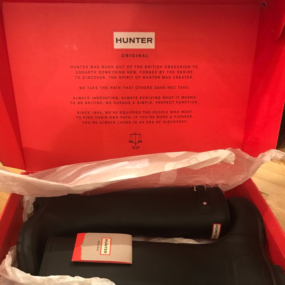 Hunter boots. Size 8 women’s. “Original tall.”